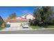 Charming single-Gathering home with a tile roof, two car garage and well-maintained landscaping at 1330 Honey Lake St, Las Vegas, NV 89110
