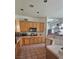 Bright kitchen featuring wooden cabinets, tile backsplash and ample counter space at 1330 Honey Lake St, Las Vegas, NV 89110