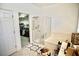 Well-lit bathroom featuring a glass-enclosed shower, soaking tub, and access to a walk-in closet at 1830 Lake Wales St, Henderson, NV 89052