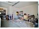 Functional garage space with storage shelves, tools, and room for various projects and equipment at 1830 Lake Wales St, Henderson, NV 89052