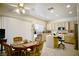 Bright eat-in kitchen features neutral cabinetry, stainless steel appliances, and breakfast bar at 1830 Lake Wales St, Henderson, NV 89052