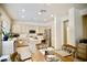 Sunny kitchen with tile floors, stainless appliances, and light wood cabinets at 1830 Lake Wales St, Henderson, NV 89052