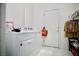 Bright laundry room with modern appliances and ample space for sorting and folding laundry at 1830 Lake Wales St, Henderson, NV 89052