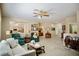 Spacious living room with a seamless transition to the kitchen, featuring neutral tones at 1830 Lake Wales St, Henderson, NV 89052