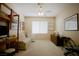 Bright living room with natural light, comfortable seating, and a functional workspace at 1830 Lake Wales St, Henderson, NV 89052