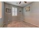 Neutral bedroom with plush carpet, window with shutters, and decorative art at 1904 Via Firenze, Henderson, NV 89044