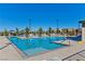 Sparkling community pool with ample seating and shade, perfect for swimming and enjoying the outdoor lifestyle at 1904 Via Firenze, Henderson, NV 89044