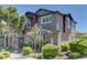 Charming home with a well-maintained yard, beautiful landscaping, and appealing exterior details at 1904 Via Firenze, Henderson, NV 89044