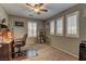 Comfortable office with natural light, carpet, shutters, and a built-in bookcase at 1904 Via Firenze, Henderson, NV 89044