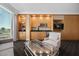 Relaxing living room with kitchenette, cabinets, and a large window offering city views at 2000 N Fashion Show Dr # 3000, Las Vegas, NV 89109