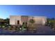 Contemporary home featuring desert landscaping and a neutral color scheme at 25 Sand Star Ln, Henderson, NV 89011