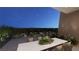 Outdoor patio area with dining table, chairs, and desert views at 25 Sand Star Ln, Henderson, NV 89011