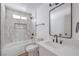 Updated bathroom featuring a shower and a vanity with black hardware at 2611 Siesta Ave, Las Vegas, NV 89121