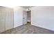 Bedroom with neutral colored walls and carpet with a view into another room at 2611 Siesta Ave, Las Vegas, NV 89121