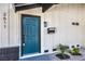 Close up of a front door featuring a vibrant blue finish at 2611 Siesta Ave, Las Vegas, NV 89121