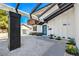 The front entrance of this charming home features desert landscaping and a colorful front door at 2611 Siesta Ave, Las Vegas, NV 89121
