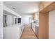 Modern kitchen featuring an island, new stainless steel appliances, and an open concept floor plan at 2611 Siesta Ave, Las Vegas, NV 89121
