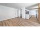 Open-concept living area with modern flooring, and an updated kitchen with a center island at 2611 Siesta Ave, Las Vegas, NV 89121