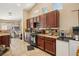 Functional kitchen featuring laminate countertops, stainless steel appliances, and ample cabinet space at 2716 Orchid Moon Ct, North Las Vegas, NV 89031