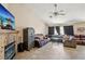 Spacious living room featuring a fireplace and ample seating at 2716 Orchid Moon Ct, North Las Vegas, NV 89031