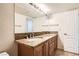 Bathroom vanity offering dual sinks, granite countertops and ample storage at 2838 Geary Pl # 4017, Las Vegas, NV 89109