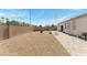 Spacious backyard featuring a patio and low-maintenance gravel landscaping at 3108 Sentimental Ct, North Las Vegas, NV 89031