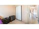 Bedroom features a closet, tile floors and neutral colored walls at 3108 Sentimental Ct, North Las Vegas, NV 89031