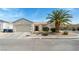 Charming single-story home with a two-car garage and desert landscaping at 3108 Sentimental Ct, North Las Vegas, NV 89031