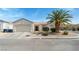 Charming single-story home with a two-car garage and desert landscaping at 3108 Sentimental Ct, North Las Vegas, NV 89031