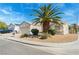 Single-story home with a well-manicured yard and inviting curb appeal at 3108 Sentimental Ct, North Las Vegas, NV 89031