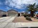 Charming single-story home featuring a low maintenance front yard, and a welcoming two-car garage at 3108 Sentimental Ct, North Las Vegas, NV 89031