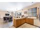 Open concept kitchen featuring breakfast bar and seamless connectivity at 3108 Sentimental Ct, North Las Vegas, NV 89031
