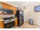 Well-lit kitchen featuring modern stainless steel appliances at 3108 Sentimental Ct, North Las Vegas, NV 89031
