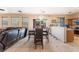 Spacious living room and dining area with tile flooring and lots of light at 3108 Sentimental Ct, North Las Vegas, NV 89031