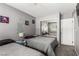 Bedroom featuring twin beds, sliding mirrored closet, and decorative pictures on the wall at 3158 Brockington Dr, Las Vegas, NV 89120