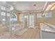 Luxurious bathroom featuring a glass shower, soaking tub, and double vanity sinks at 3372 Westwind Rd, Las Vegas, NV 89146