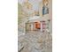 Majestic foyer showcasing a chandelier, staircase, marble floors, and artistic wall decor at 3372 Westwind Rd, Las Vegas, NV 89146