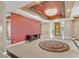 Elegant living room featuring decorative ceiling and ornate chandelier at 3372 Westwind Rd, Las Vegas, NV 89146