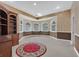 Inviting office space featuring built-in shelving and large windows at 3372 Westwind Rd, Las Vegas, NV 89146