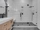Modern bathroom featuring a glass-enclosed shower with stylish tile and updated fixtures at 363 El Pico Dr, Henderson, NV 89014