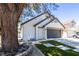Charming one-story home featuring new landscaping, an attached garage, and a well-maintained front yard at 363 El Pico Dr, Henderson, NV 89014