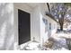 Inviting front door entrance with a modern dark-stained door and neutral paint at 363 El Pico Dr, Henderson, NV 89014