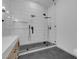 Modern main bathroom shower with dual shower heads and frameless glass enclosure at 363 El Pico Dr, Henderson, NV 89014