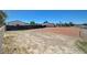 Large dirt backyard with some fencing and clear blue sky. Ready for your landscape design! at 3917 Leon Ave, Las Vegas, NV 89130