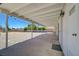 Spacious covered patio offering ample space for outdoor seating and overlooks the expansive backyard at 3917 Leon Ave, Las Vegas, NV 89130