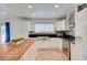 Bright, modern kitchen with a central island, stainless steel appliances and plenty of storage at 3917 Leon Ave, Las Vegas, NV 89130