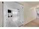 Spacious living room boasts bright windows, neutral walls, and ceiling fans at 3917 Leon Ave, Las Vegas, NV 89130