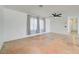 Bright living room featuring a ceiling fan and large windows with sheer curtains at 3917 Leon Ave, Las Vegas, NV 89130