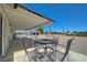 Charming patio area with seating, perfect for relaxing and enjoying the expansive backyard views at 3917 Leon Ave, Las Vegas, NV 89130