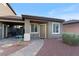 Charming home exterior with well-manicured landscape, stone pathway, and neutral color palette at 3934 Sangre De Cristo Ave, Las Vegas, NV 89118